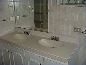 The main bath room has two sinks